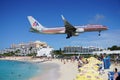 An American Airlines Boeing 757 lands over Maho Beach in St Martin