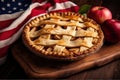 American apple pie with fresh apples on rustic wooden background. Selective focus