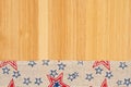 American background with retro USA stars and stripes burlap ribbon on wood Royalty Free Stock Photo