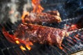 American bbq ribs cooking on grill Royalty Free Stock Photo