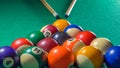 American billard, pool balls on the table with the cue Royalty Free Stock Photo