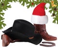 American black hat with cowboy boots.Christmas objects isolated