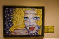 American blonde portrait made of junk mail advertisements and tax forms by Sandy Schimmel