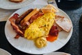 American breakfast with omelet bacon and sausage