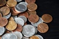 American cents coins are scattered on a black wooden surface. Money background Royalty Free Stock Photo