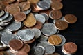 American cents coins are scattered on a black wooden surface. Money background Royalty Free Stock Photo