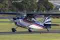 American Champion 8KCAB single engine light aircraft VH-FKM at Illawarra Regional Airport. Royalty Free Stock Photo