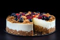 American cheesecake dessert garnished with fresh berries over dark background. Royalty Free Stock Photo