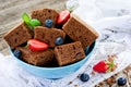 American chocolate cake brownie with summer fruits and berries Royalty Free Stock Photo