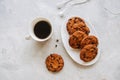 American chocolate chip cookies in a white plate cup of coffee Royalty Free Stock Photo