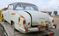 1951 American Chrysler Newport car on a recovery truck being taken for restoration