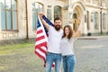American citizenship is a very precious possession. Bearded man and sensual woman holding american flag on July 4th Royalty Free Stock Photo