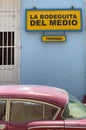 American classic car in front of Bodeguita del Medio in Trinidad, Cuba Royalty Free Stock Photo