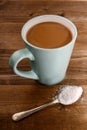 American coffee with milk and sugar on a spoon Royalty Free Stock Photo