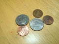 American Coins Laying On Wooden Table Royalty Free Stock Photo