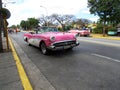 American convertible vintage cars parked on the main street in Varadero Cuba