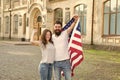 American couple USA flag. Patriotic spirit. Independence day. American tradition. Students exchange program. National Royalty Free Stock Photo