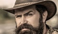 American cowboy. Leather Cowboy Hat. Portrait of young man wearing cowboy hat Royalty Free Stock Photo