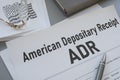 American Depositary Receipt ADR is shown using the text