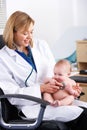 American doctor examining baby Royalty Free Stock Photo