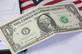 1 american dollar bill with united states flag . Royalty Free Stock Photo