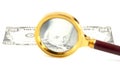 American Dollar Close Up with a Magnifying Glass