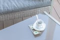 American dollars bill and empty cup of coffee on a glass table of outdoor cafe. Payment, tip Royalty Free Stock Photo