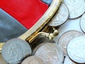 American dollars in a coin purse on a white background. Royalty Free Stock Photo