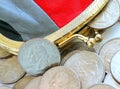 American dollars in a coin purse on a white background. Royalty Free Stock Photo