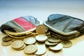 American dollars in a coin purse on a white background. Close-up. Royalty Free Stock Photo