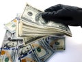 American dollars and hand. To steal money. Royalty Free Stock Photo