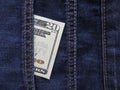 American dollars in a jeans pocket