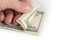 American dollars or US dollars: hand counting one hundred American money or 100 USD Royalty Free Stock Photo