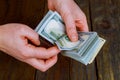 American dollars in a women hands. Royalty Free Stock Photo