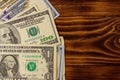 American dollars on wooden background. Top view, copy space Royalty Free Stock Photo