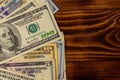 American dollars on wooden background. Top view, copy space Royalty Free Stock Photo