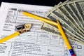 broken pencil on income tax form Royalty Free Stock Photo