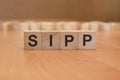 American economy and business concept. wooden cubes with the inscription - SIPP