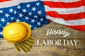 American employment in construction, Labor day and industrial work concept with close up on a yellow hard hat and safety gloves Royalty Free Stock Photo