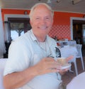 Tourist enjoying coffee at a restaurants along the eastern coast around Pescara, Italy with its relaxing view of the sea