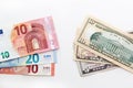 American euro and dollars banknotes for business design. Cash money various currency paper bills on white background Royalty Free Stock Photo