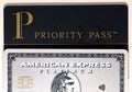 American Express Amex Platinum & Priority Pass Card on a White Table