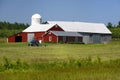 American Family Farm - Red Barn and Tractor Royalty Free Stock Photo