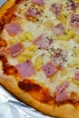 American Famous Junk Food Hawaiian Pizza With Ham And Fresh Pineapple On Top Mix With Mozzarella Cheese