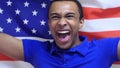 American Fan Celebrates holding the Flag of USA in Slow Motion Royalty Free Stock Photo