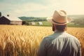 American farmer wheat field standing. Generate Ai Royalty Free Stock Photo