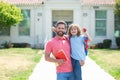 American father and son walking trough school park. Portrait of teacher and happy pupil. Royalty Free Stock Photo