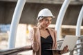 American female engineer celebrate in city