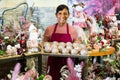 American female offering Christmas decorations Royalty Free Stock Photo