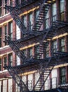 American fire escapes on an old building at Chicago Center - Soft Sunset Artistic Effect Royalty Free Stock Photo